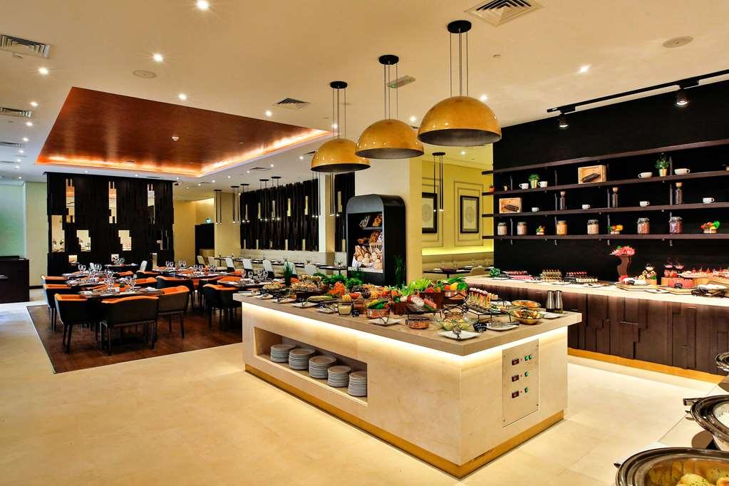 Four Points By Sheraton Production City, Dubai Hotel Restaurant photo