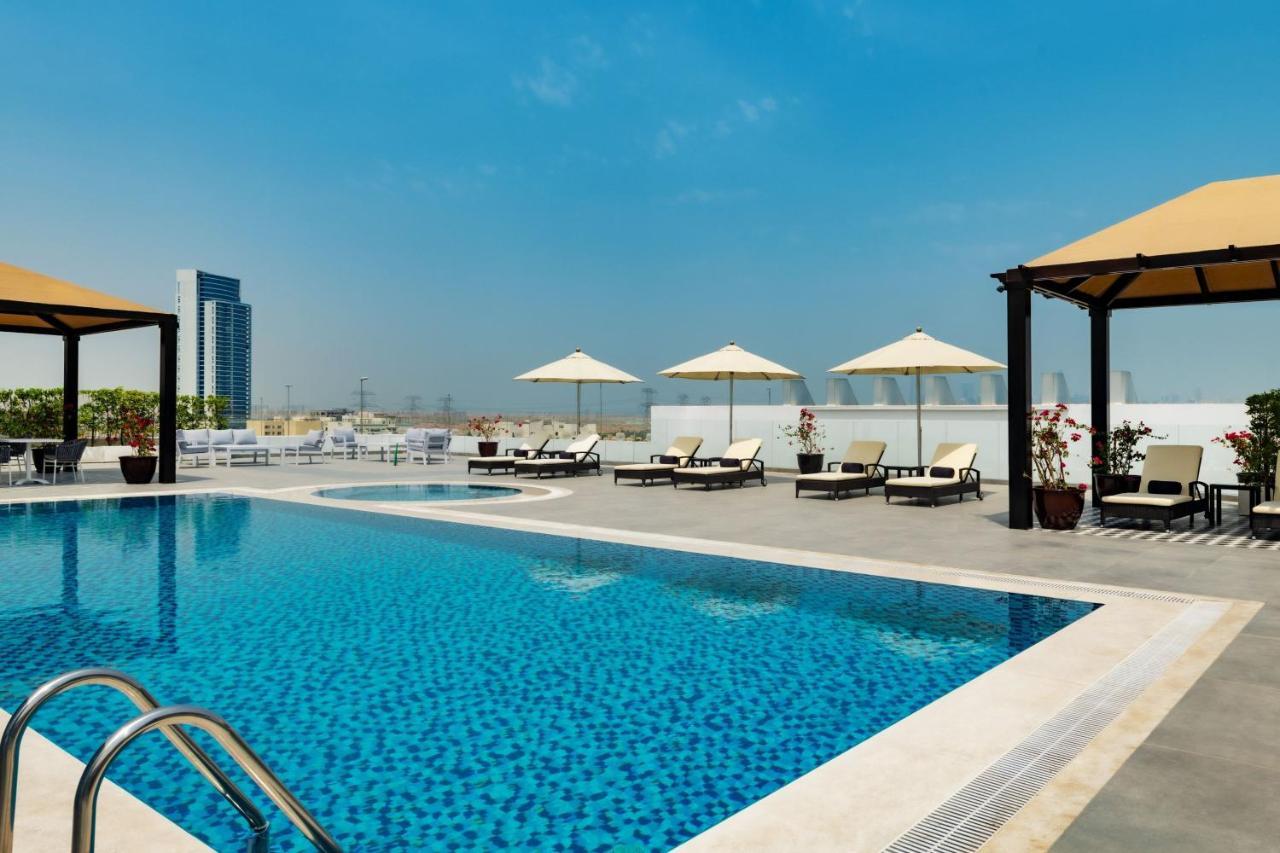 Four Points By Sheraton Production City, Dubai Hotel Exterior photo